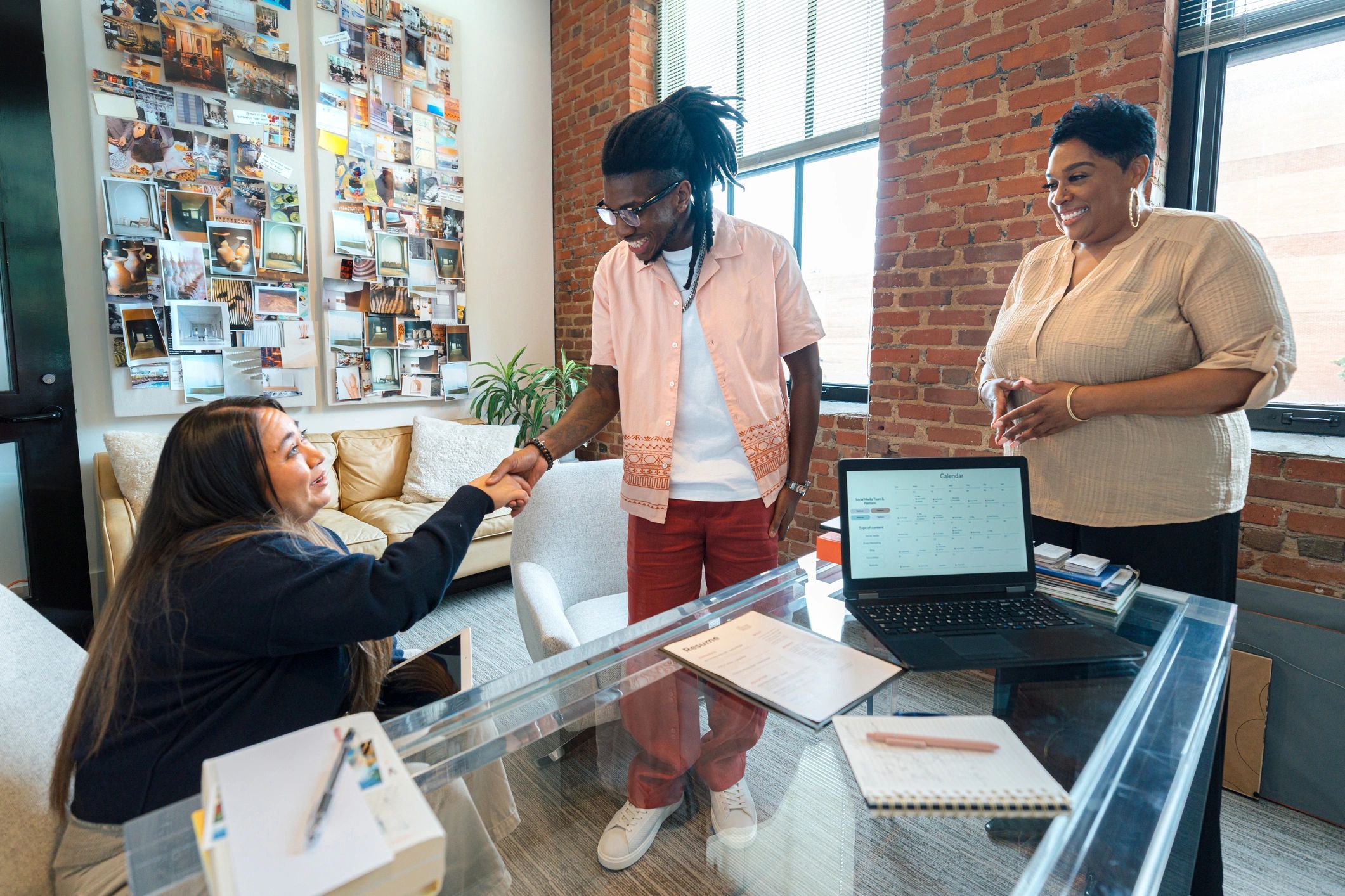 Hiring manager introducing a job applicant in an office